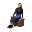Sitzwürfel Cube Classic mit sitzender Person