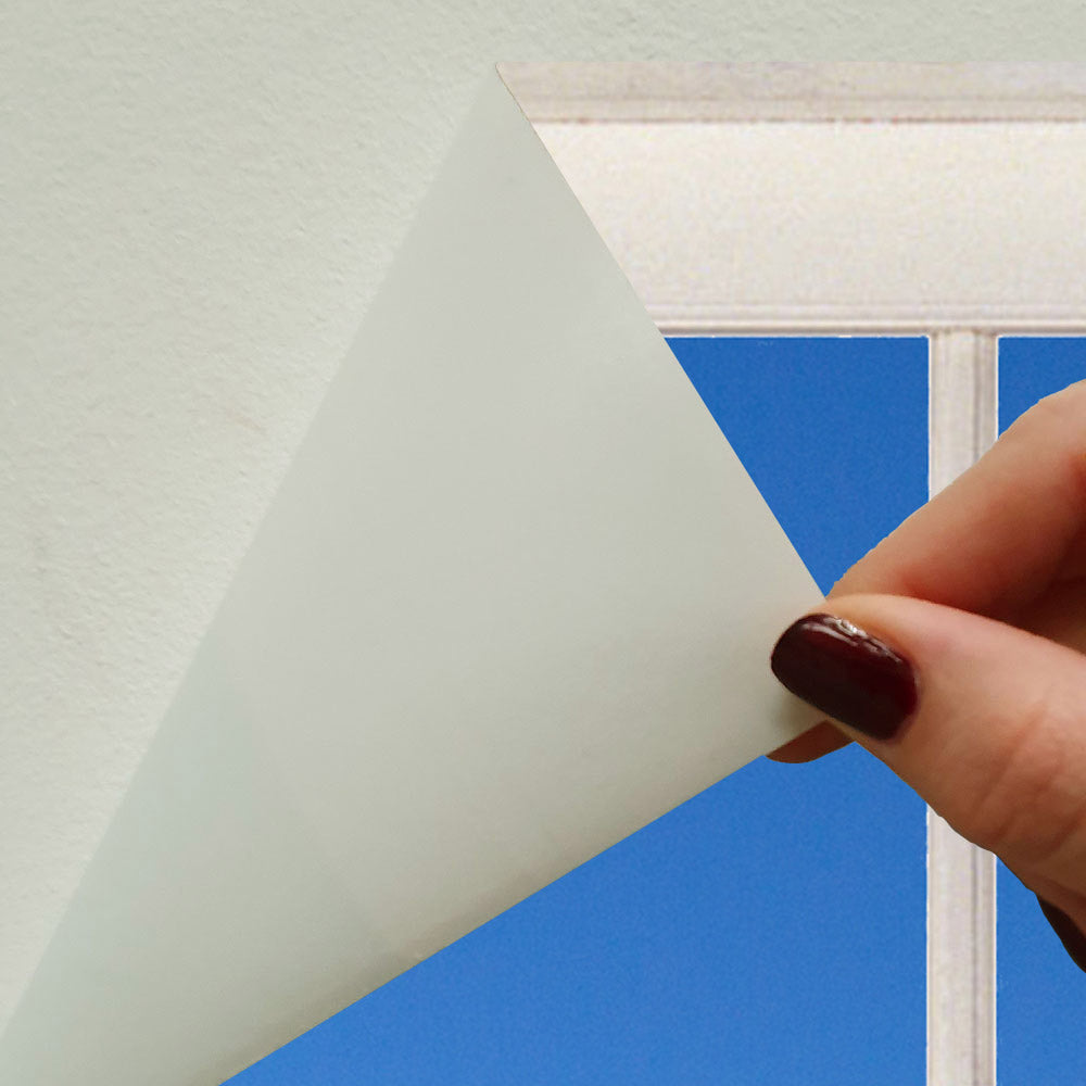 Detailbild vom Wandaufkleber der Rückseite vom Material das abgezogen wird.