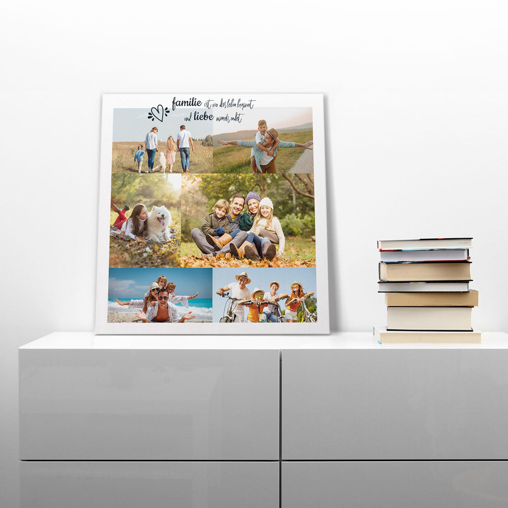 Personalisierte Leinwand mit einer Familienfoto-Collage und dem Spruch „Familie ist wo das Leben beginnt und Liebe niemals endet“, dekorativ auf einem Sideboard platziert.