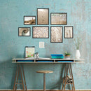 Poster-Set "Ostsee Natur" Rückseite im Atelier aufgehangen, an einer blauen shabby Wand über einem Schreibtisch.