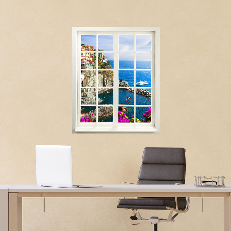 Selbstklebende Wandtapete in Form eines Fensters mit toller Landschafts-Fotografie auf das Dorf Cinque Terre. In einem Arbeitszimmer, an einer gelben Wand über einem Schreibtisch.