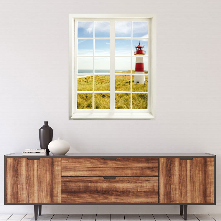 Wandtattoo Fensterblick "Leuchtturm" über moderner Holzkommode.