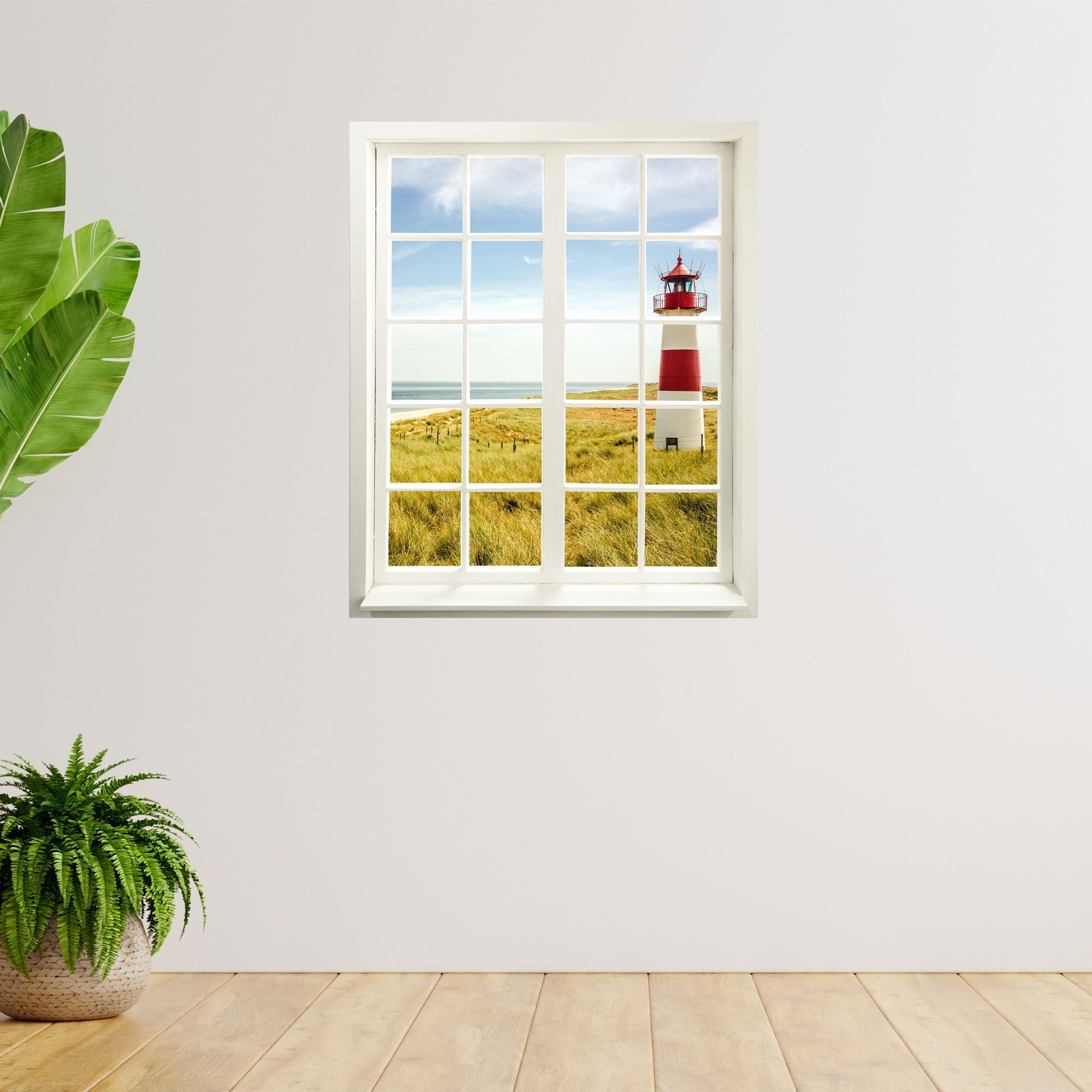 Wandtattoo Motiv Fensterblick geschlossen "Leuchtturm" in einem Zimmer mit Topfpflanzen.