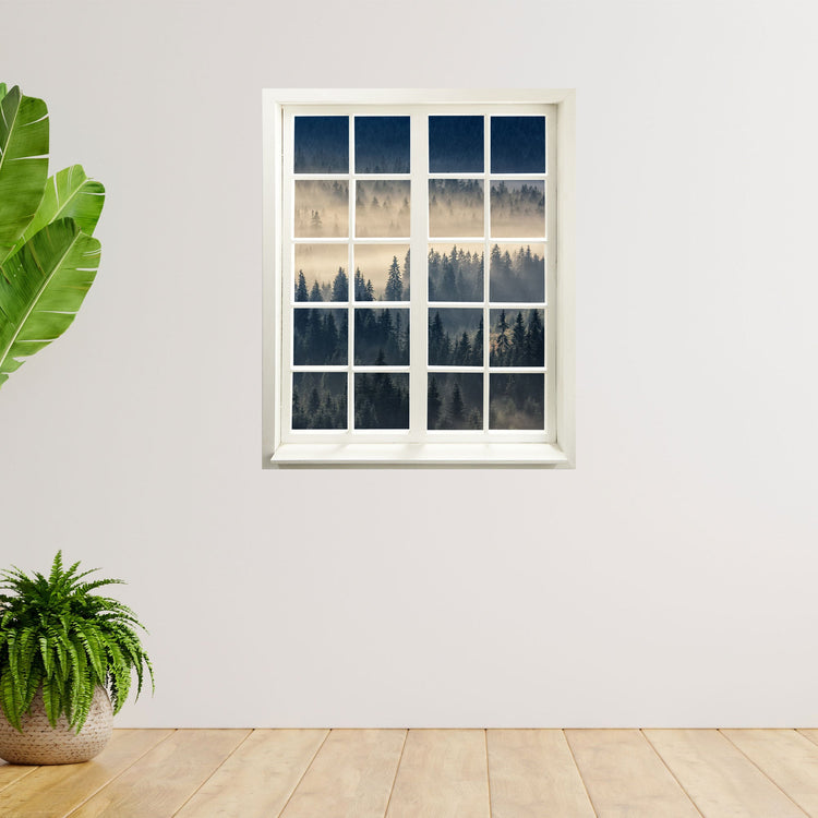 Wandtattoo Fensterblick "Nebelwald" an freier Wand neben Zimmerpflanzen.