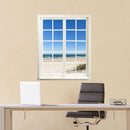 Selbstklebender, gedruckter, Wandaufkleber für Wände und Möbel, mit einem Sprossenfenstermotiv mit dem Ausblick "Ostsee und Meer". In einem Arbeitszimmer über einem Schreibtisch.