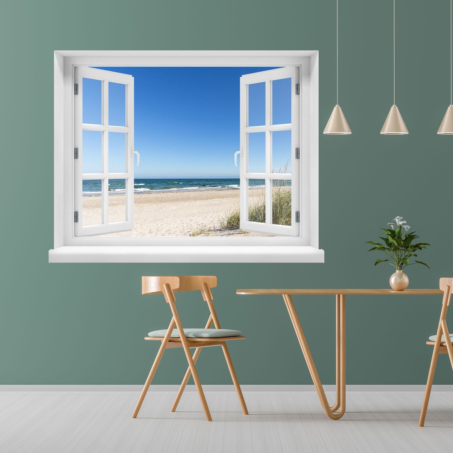 Offenes Fenster mit Blick auf Sandstrand, Meer und blauen Himmel – dekorativer Wandaufkleber mit 3D-Effekt für sommerliches Urlaubsfeeling im eigenen Zuhause. Als Dekoidee an einer grünen Wand im Esszimmer verklebt.