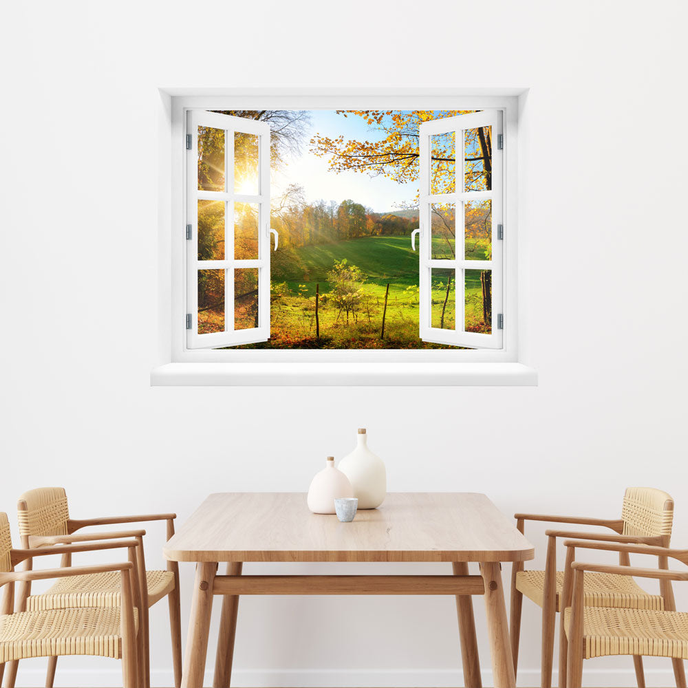 Wandaufkleber offenes Fenster "Wald mit Lichtung" am Esstisch.