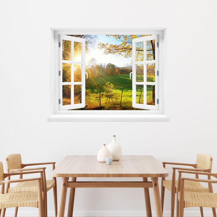 Wandaufkleber offenes Fenster "Wald mit Lichtung" am Esstisch.