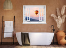 Wandaufkleber mit dem Motiv offenes Fenster mit Blick auf einen Heißluftballon im Sonnenuntergang über einer Berglandschaft – dekoratives 3D-Fensterbild mit Panorama-Effekt. Als Dekoidee über einer Badewanne im Badezimmer an einer natur Wand.