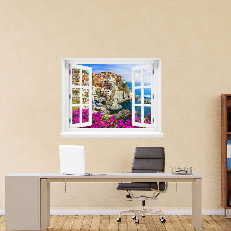 Wandaufkleber - Fensterblick "Cinque Terre" am Arbeitsplatz an einer beigen Wand.