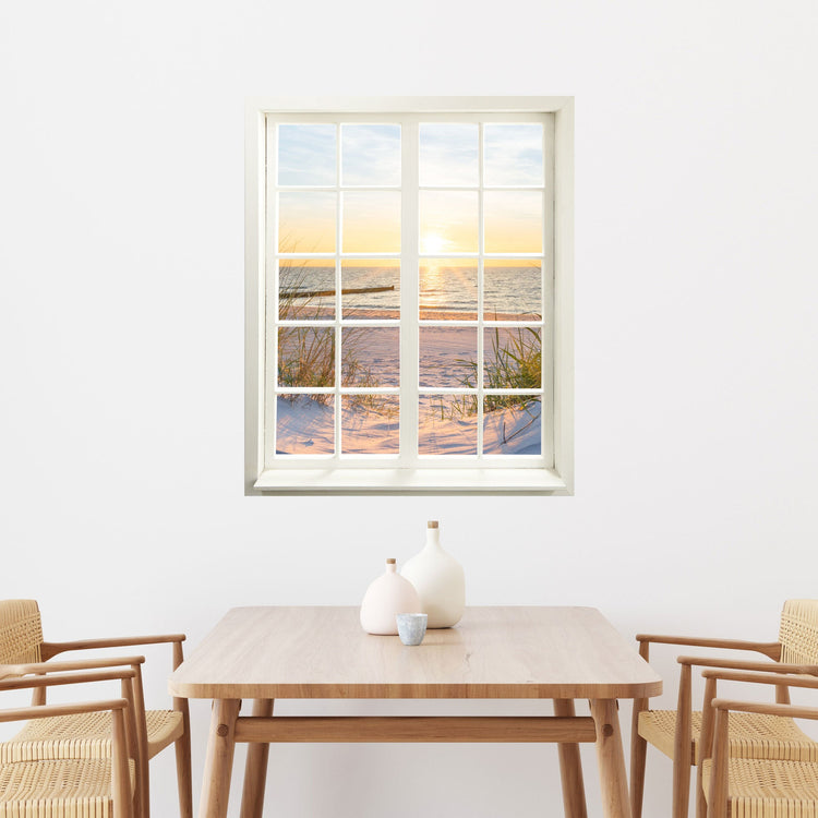 Selbstklebende Wandaufkleber- Fensterbild mit Ostseemotiv "Düne und Meer" für Flur, Bad und Wohnzimmer. Hier über einem Esstisch an einer weissen Wand.