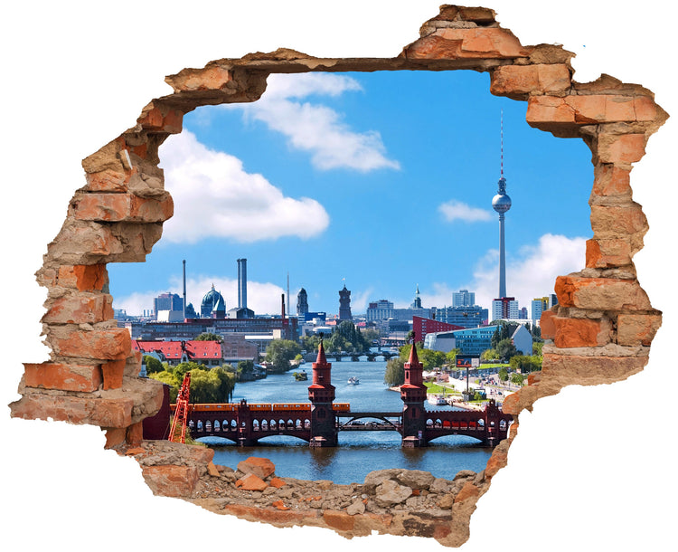 3D-Wandtattoo mit Backstein-Effekt und Blick auf die Berliner Oberbaumbrücke, die Spree und den Fernsehturm, das eine realistische Wanddurchbruch-Optik erzeugt.