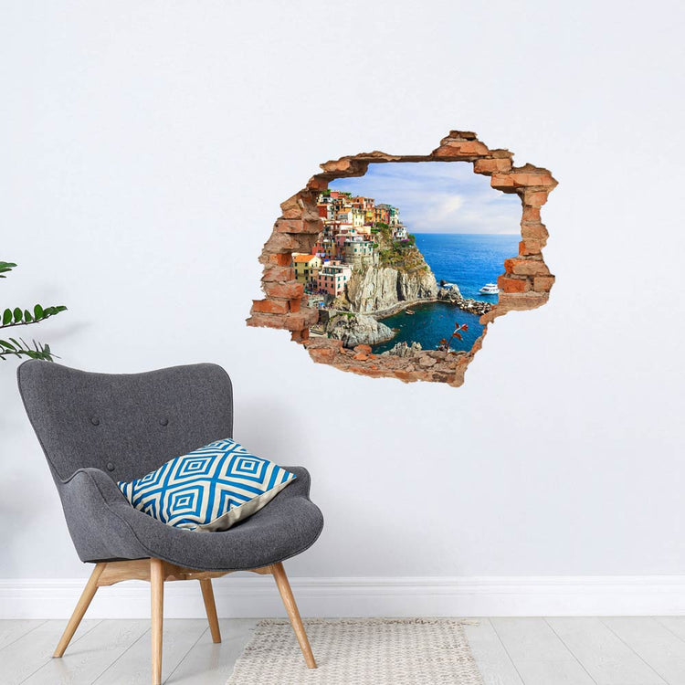 Wandtattoo - Wanddurchbruch Aufkleber, Backstein "Cinque Terre" in einer Leseecke mit einem grauen Sessel an der Wand.