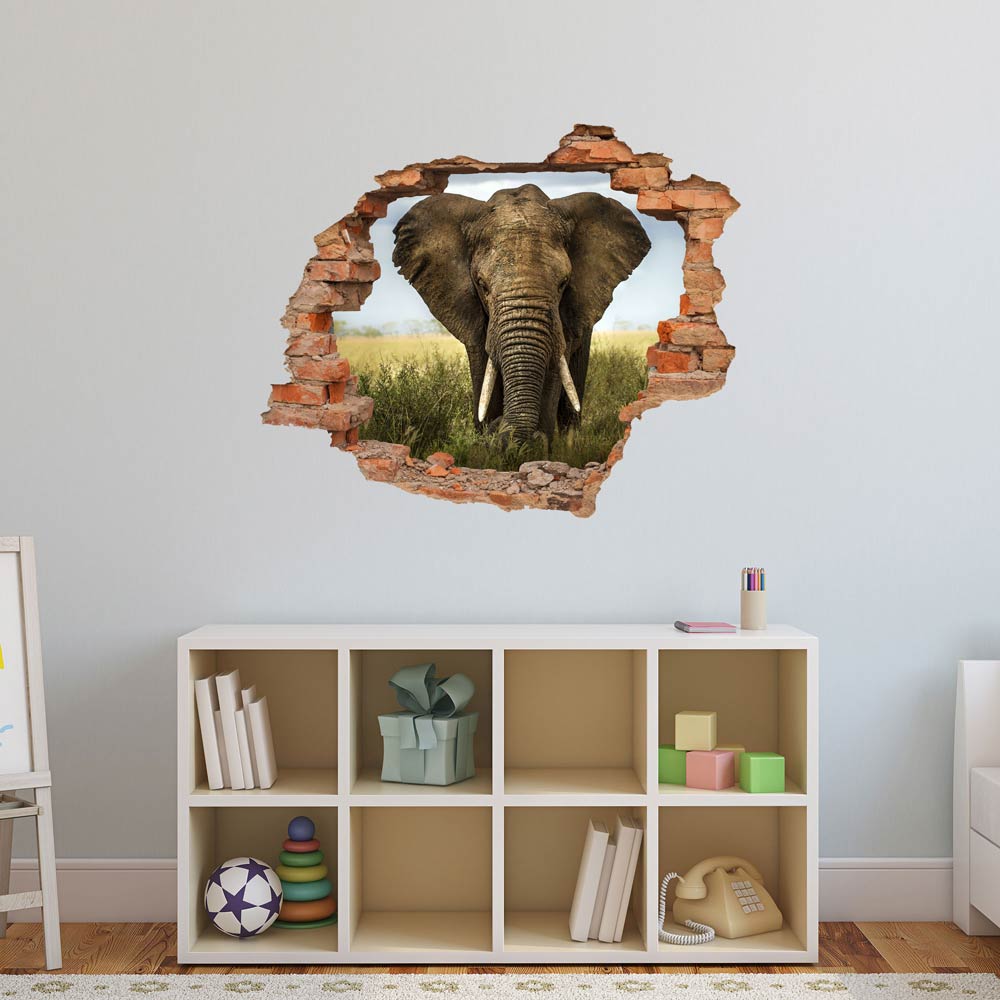 Wandtattoo Mauerdurchbruch "Elefant" im Kinderzimmer über einem Regal verklebt.