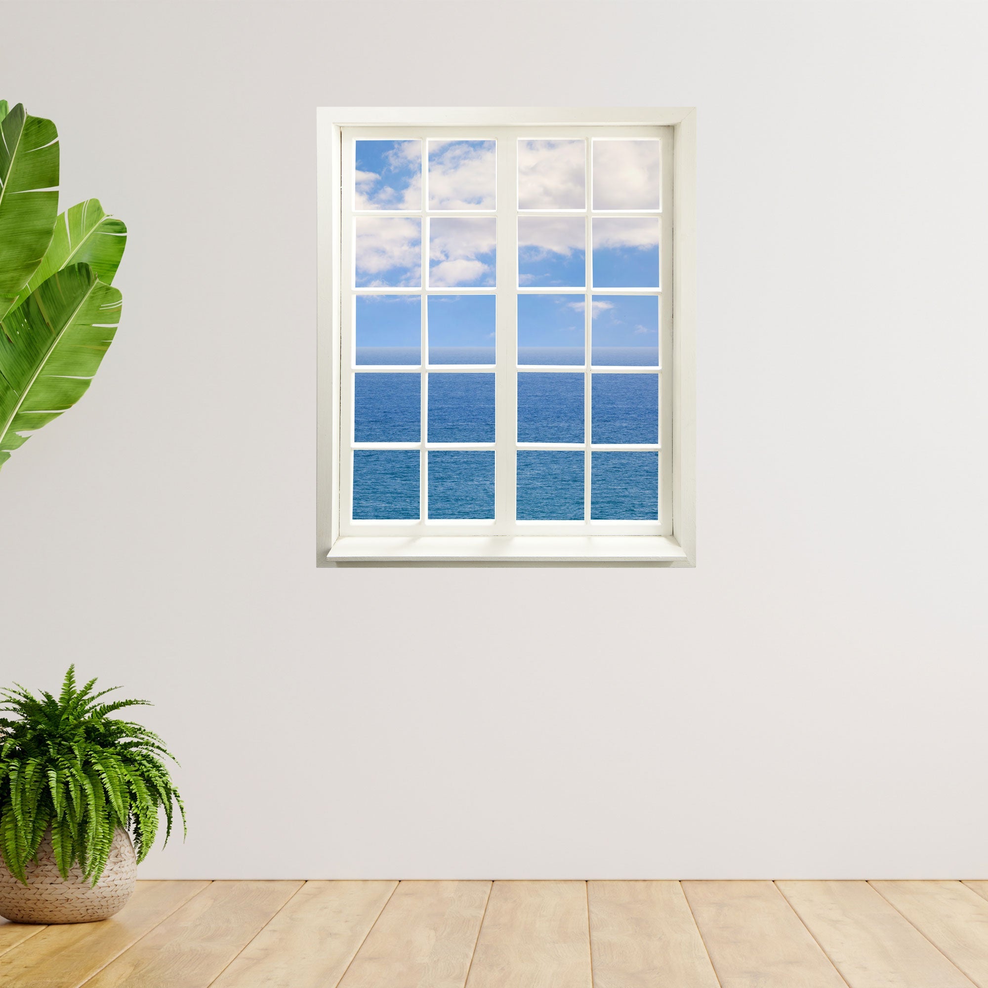 Selbstklebendes Wandaufkleber-Bild für Flur, Bad oder Wohnzimmer. "Meer und Wolken" an einer freien Wand neben Zimmerpflanzen.