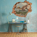 Wandtattoo - Wanddurchbruch "Pachycephalosaurus" am Arbeitstisch an einer blauen shabby Wand.