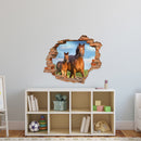 Wandtattoo - Wanddurchbruch "Pferd mit Fohlen" über einer Kommode im Kinderzimmer verklebt.