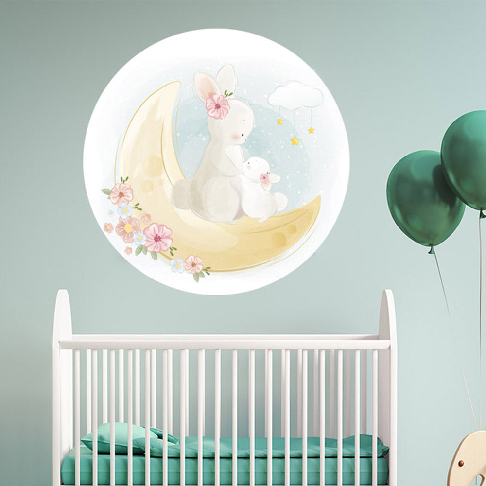 Wandtattoo rund "Mond und Hasen" Babybett und grüne Ballons.
